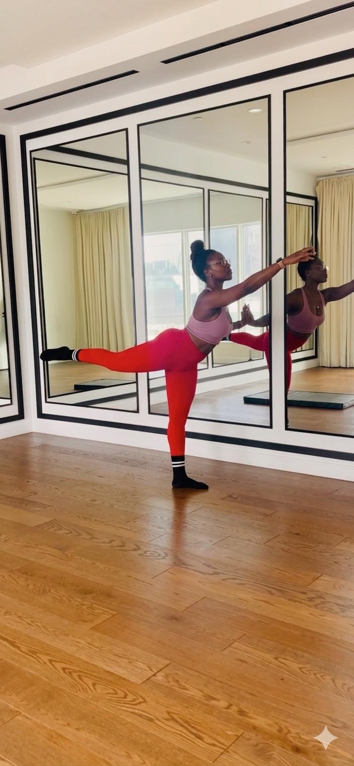 Rolake Fakunle in a dancer balance pose
